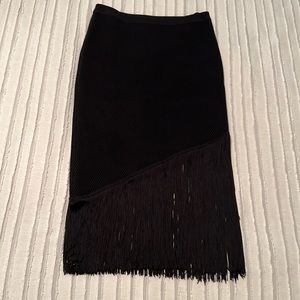 Ribbed black skirt with fringe